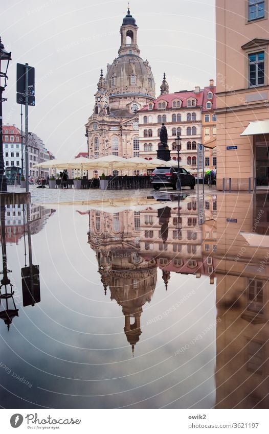 sandstone mountains Frauenkirche Dresden Baroque famous Historic Landmark Tourist Attraction houses Window Puddle Reflection Water Old town