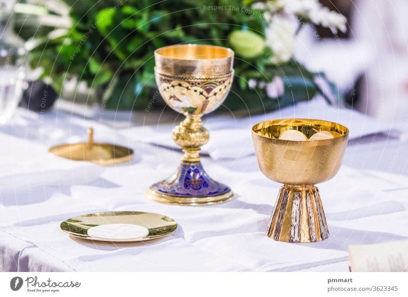 altar with host and chalice with wine in the churches of the pope of rome, francesco cup cross christianity gold sacred mass pyx goblet contain hosts blood body