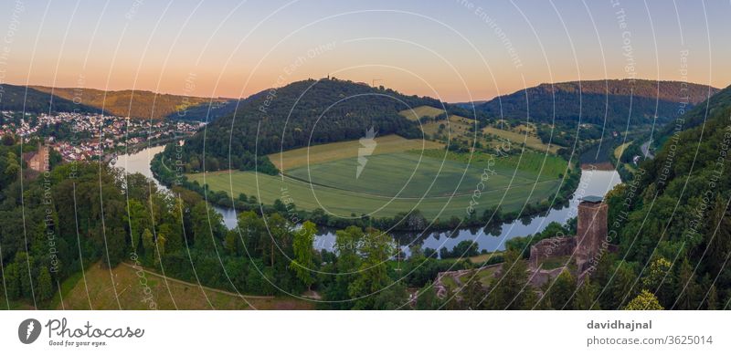 The Neckar Loop near Neckarsteinach. neckar loop river horseshoe neckarschleife aerial aerial view landmark blue sky evening twilight cloud rock canyon mountain