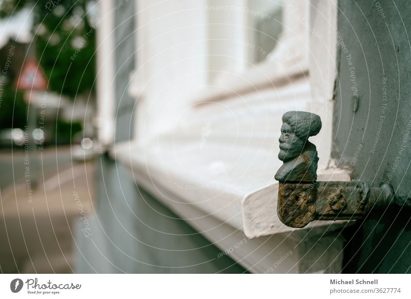 Shutter holder with strict view at an old house Window Vintage Old House (Residential Structure) built Facade Town Retro