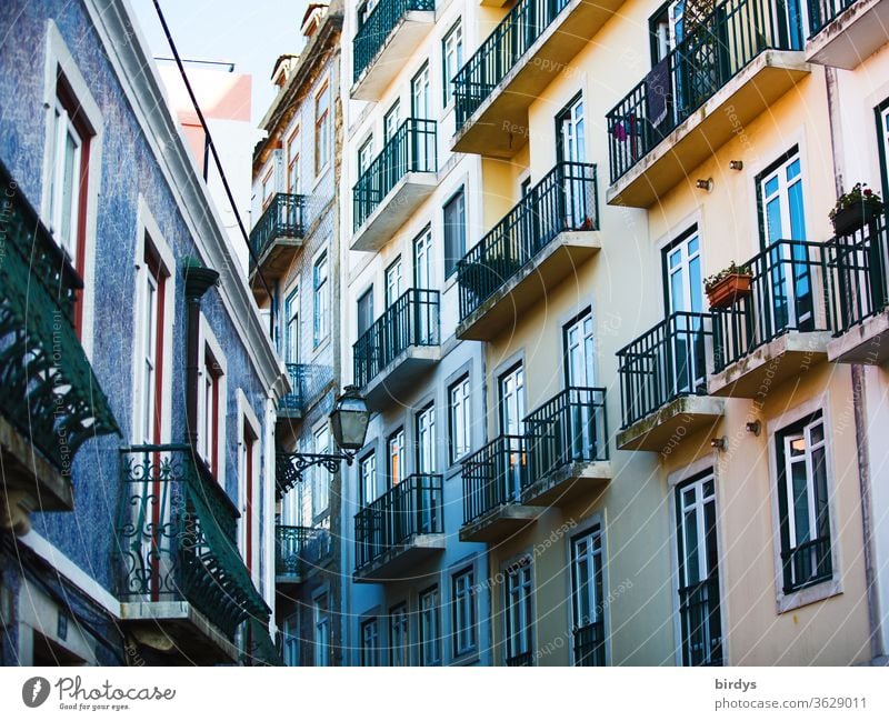House facades with balconies. Renovated old buildings in the city Facades Window Balconies Old building dwell Multistory Town Authentic Apartment house