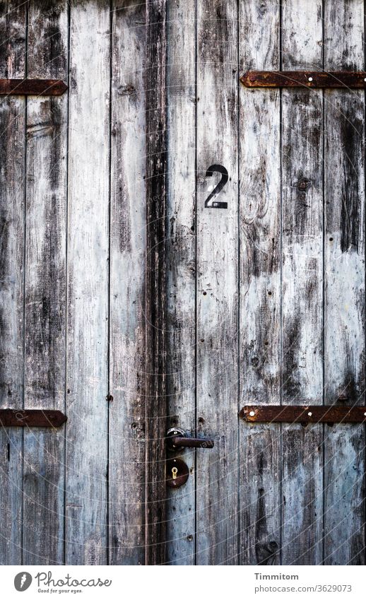 Door no. 2 door wood number Old handle Door lock Metal Colour Deserted Door handle Closed Safety Brown