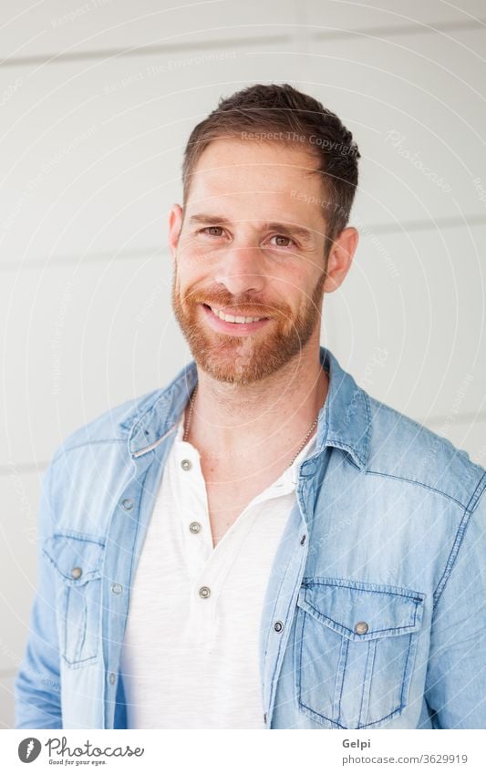 Portrait Of A Casual Guy With Denim Shirt A Royalty Free Stock Photo From Photocase