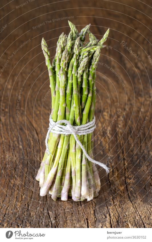 wild green asparagus on wood Asparagus Rustic Bundle Thread threads Nutrition Food ingredient Diet White Vegetable Fresh Heap salubriously background Delicious