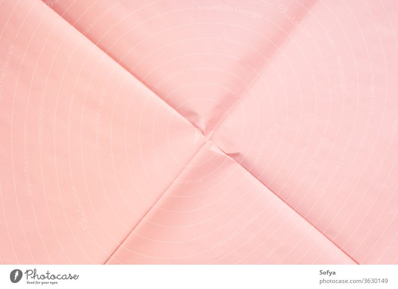 Pink paper background with crease texture pink coral wrapping geometry abstract art concept backdrop modern copy space mockup color year pastel trendy minimal