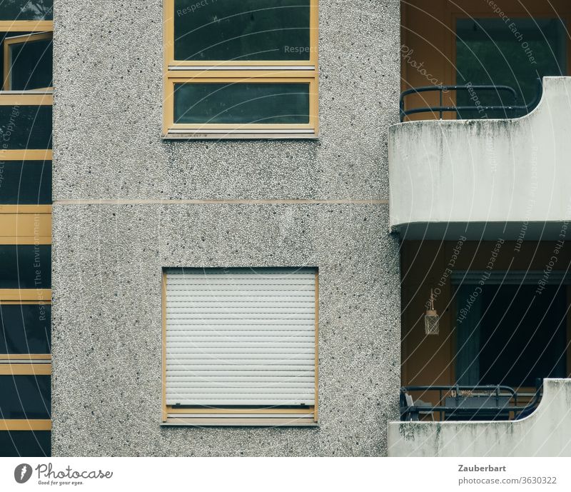 Facade of a residential house, windows and balcony made of concrete in Neukölln House (Residential Structure) High-rise social housing Apartment Building