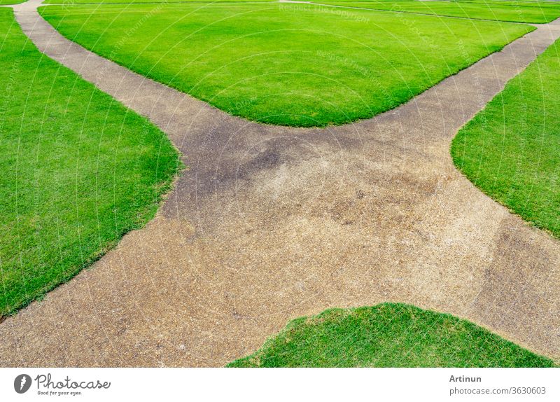 Pathway on the green lawn texture background. Intersection walkway abstract area backdrop beautiful clean closeup color competition crossroads curve design