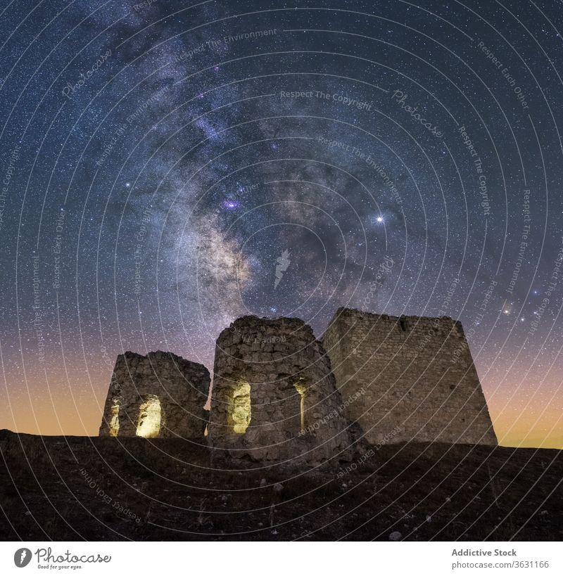 Castle in the mountains under the Milky Way castle milky way night rock rough landscape sky twilight nature wild galaxy spectacular scenery travel adventure