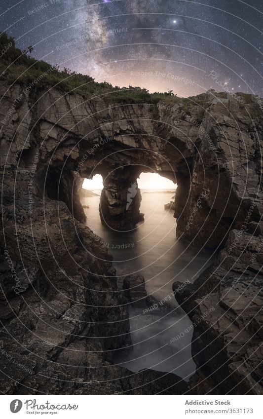 Night landscape with rocky coast and Milky Way cliff milky way night rough wild sea star dark sky nature shore ocean scenic tranquil stone picturesque coastline