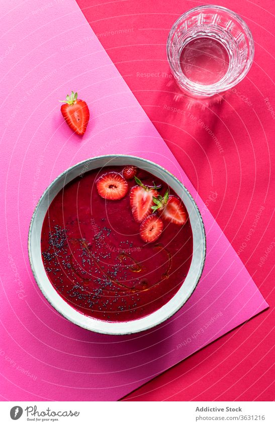 Strawberry and beet gazpacho in bowl beet-root overhead gastronomy recipe ingredient cuisine traditional herb homemade spanish sweet colorful creative food