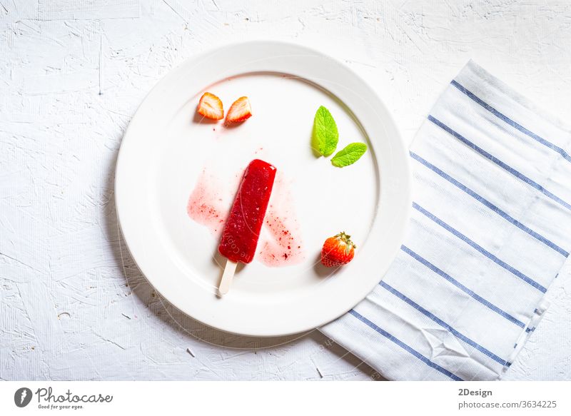 Delicious strawberry popsicles on white background ice cream pole dessert food sweet cold mint glace stick fresh healthy snack top cool dish eat defrost