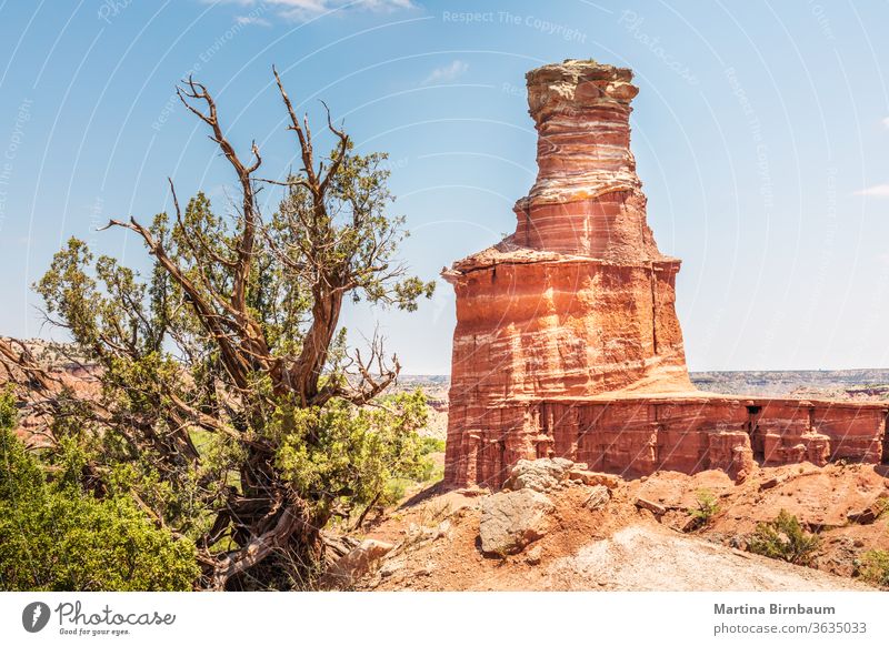 The famous Lighthouse Rock at Palo Duro Canyon State Park, Texas lighthouse rock canyon desert stone pile clouds landscape travel outdoor nature
