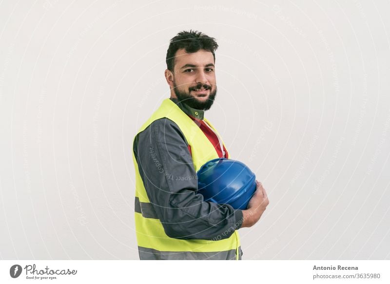 Construction worker portrait on white wall posing construction man bearded middle eastern professional outdoors white background people person 30s 40s