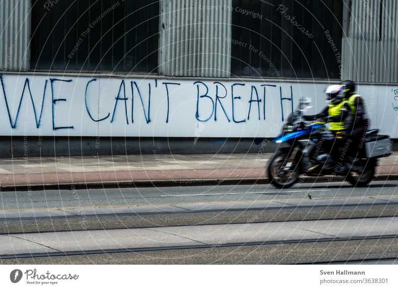 we can't breathe,roller with two people Scooter Driving Transport Wall (building) Street Multicoloured Colour photo Exterior shot Engines Cool (slang)