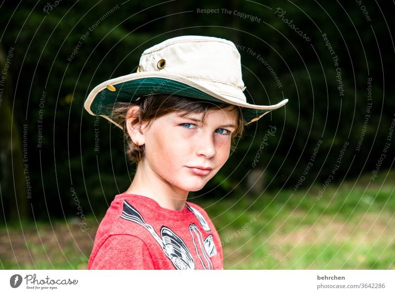 reminiscences Cool Cool (slang) Cowboy hat Hat Brash expectant Expectation Love Colour photo pretty observantly Close-up Child Boy (child) Family & Relations