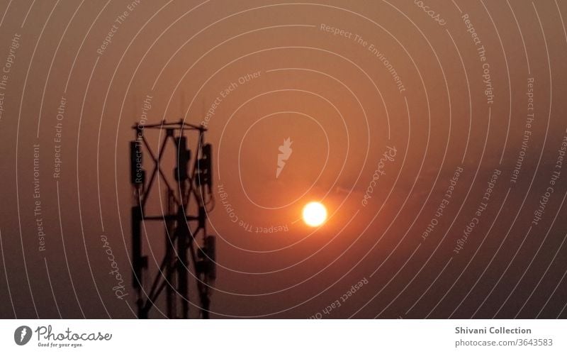 Telecommunication tower with sunrise moments with colourful sky background. Copy space nature and environment concepts. Antenna Beautiful scenery broadcast