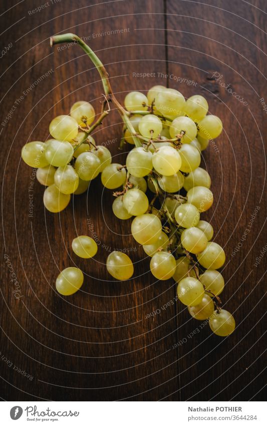 White grapes Fruit Wooden table flat lay Food Nutrition Colour photo Fresh Studio shot Harvest Nature Table Organic Bunch of grapes Healthy Eating Juicy