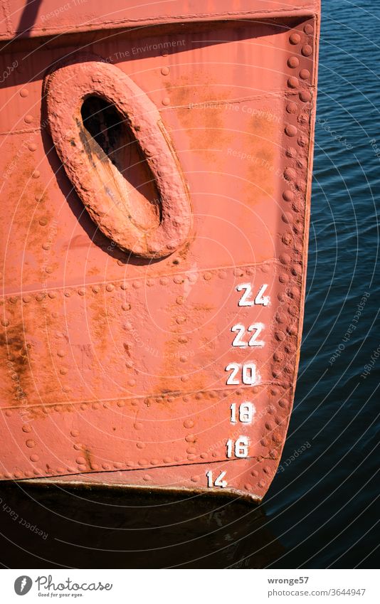 Bow and draught indicator Draft Watercraft Navigation Harbour Ocean Exterior shot Colour photo Deserted Day Detail Auburn boat Old metal sheet rivets Riveted