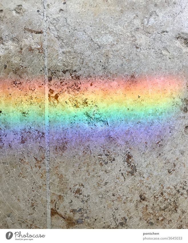 A colourful rainbow on a stone float. Symbolism. Hope, joy Rainbow Ground stony colors variegated symbolism Joy variety LBGTQ Respect Tolerant