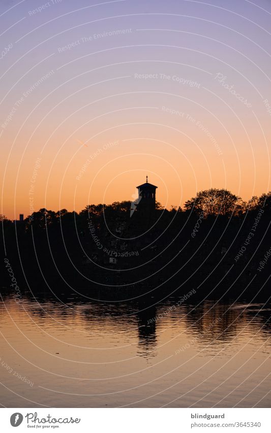 Evening atmosphere at the Main in Hanau Sunset Sky Dusk Nature River Water Inland navigation Church spire Waves Wet Colour photo Deserted Navigation Light