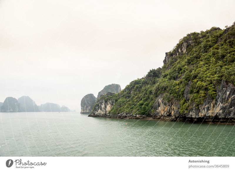 Landscape in Halong-Bay, Vietnam shrub bush shrubby green layer distance wide Waves pile Ha-Long Asia Exterior shot Vacation & Travel Stone Rock Mountain Water
