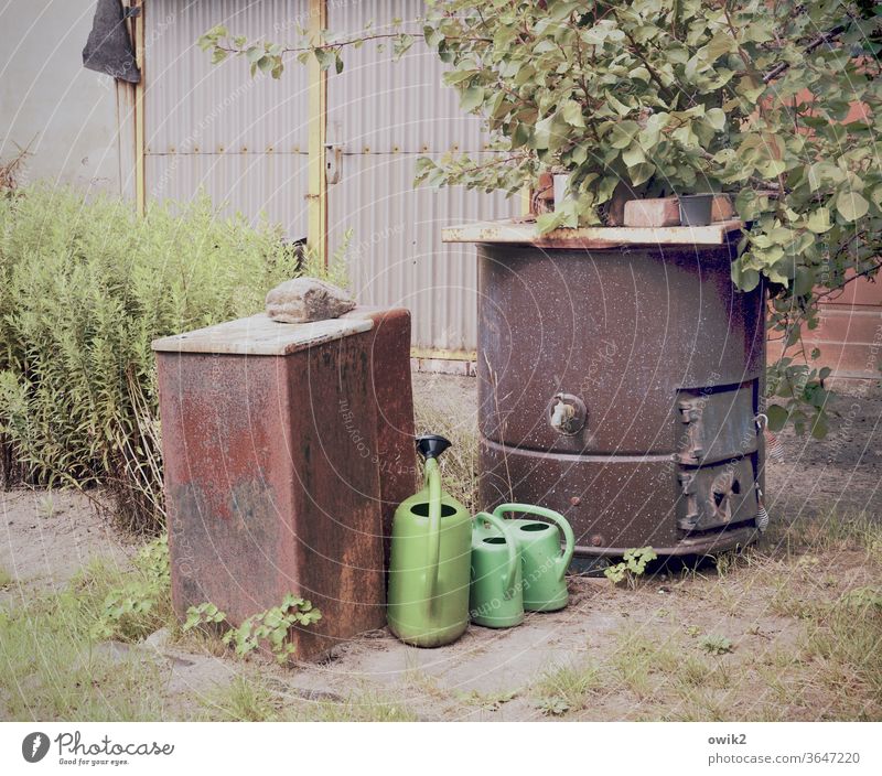 We can't be seen Watering can Plastic Colour photo Stand Wait Detail Exterior shot Deserted Day Long shot Copy Space top Eaves Iron-pipe Family & Relations Many