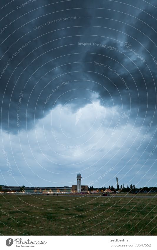 Tempelhofer Feld with rain clouds Berlin Far-off places Trajectory Airport Airfield Freedom spring Sky Horizon Deserted taxiway Skyline Summer Mirror image
