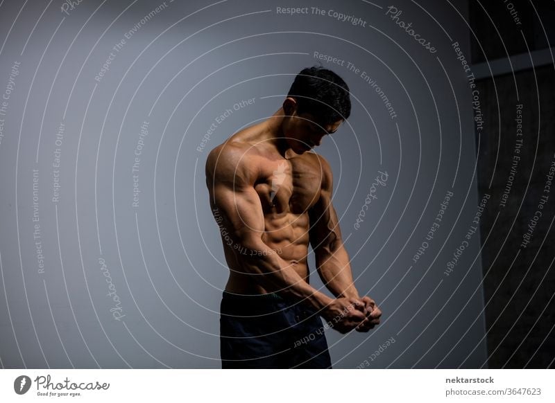 3647623 Asian Fitness Model Flexing Muscles Nam Vo Photocase Stock Photo Large 