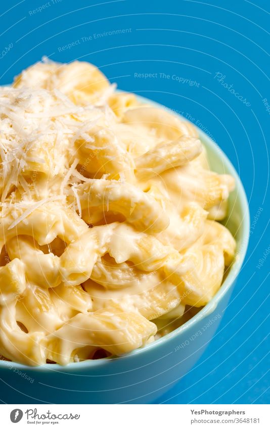 Mac and cheese close-up. Bowl with macaroni and bechamel sauce american american food blue bowl carbs cheddar cheesy comfort food copy space cream creamy