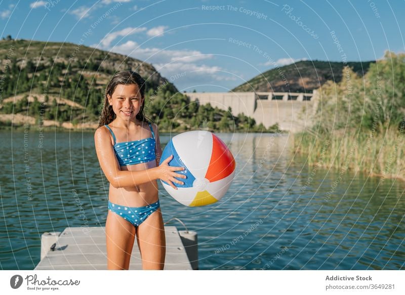 girl in bikini on the lake Stock Photo