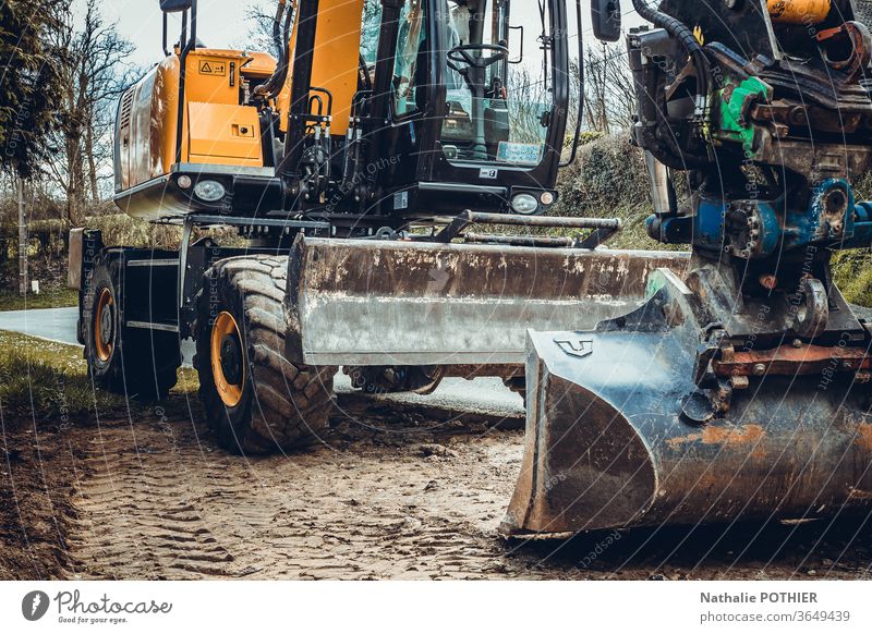 Excavator Earth machine work Construction site Industry Construction vehicle Exterior shot Colour photo Work and employment Excavator shovel Dirty