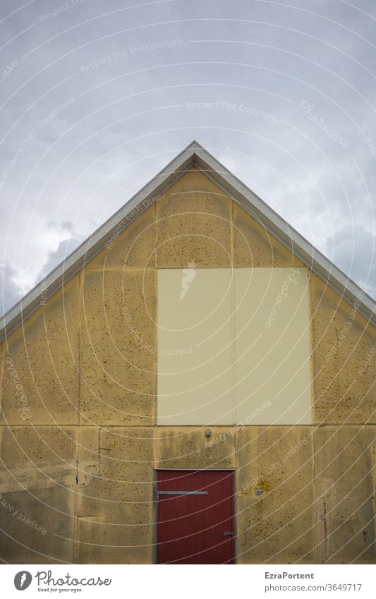 square text space on the gable side of an old house with a decorative red door and vivid cloudy sky House (Residential Structure) built Facade Wall (building)