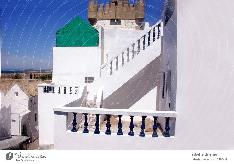in Assilah Building White Wall (building) Light Architecture Vantage point Handrail Stairs Tower Morocco