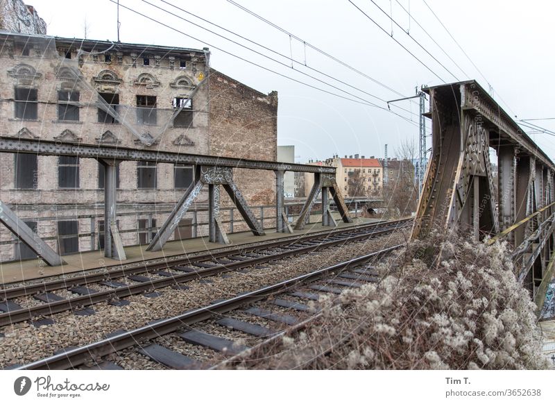 Living by the railway Berlin Lichtenberg Railroad tracks bridge House (Residential Structure) built Town Architecture Facade Window Deserted Capital city