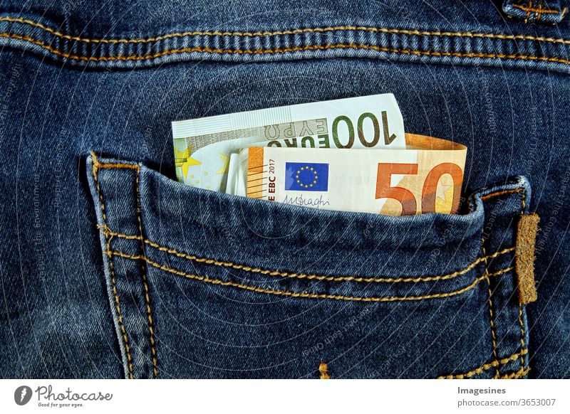 Euro banknotes in the pockets of the jeans. Just steal the money. Pickpockets Money Loose change Euros Banknote Bag Jeans Pants concept Luxury Save Euro notes