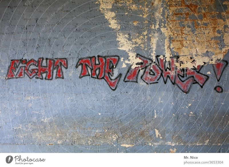 Fight against the power ! Graffiti Wall (building) Characters Facade built Gray lettering Characters and letters Dirty powerful Politics and state Abstract