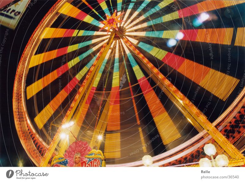 beautifully colorful Ferris wheel Fairs & Carnivals Speed Multicoloured Long exposure Theme-park rides Evening fair Light Partially visible Bright Contrast