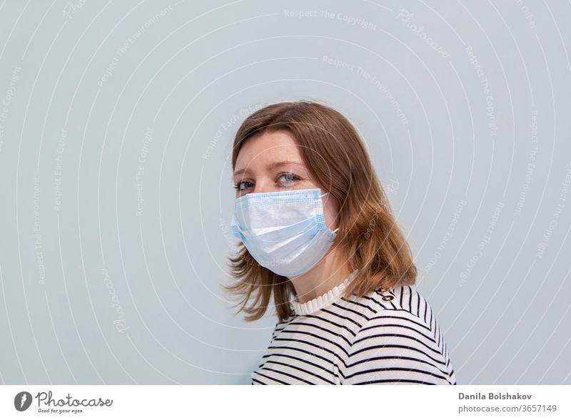 woman wearing an anti-virus protection mask to prevent flu infection, allergies, virus protection, COVID-19, and corona virus pandemic disease 2019 2019-ncov