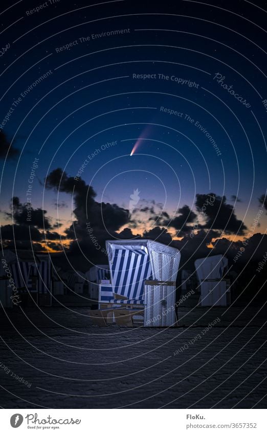 Comet Neowise over a beach chair at the North Sea coast stars Beach Saint Peter Ording sanct peter-ording St. Peter-Ording Night Astronomy Astrophotography