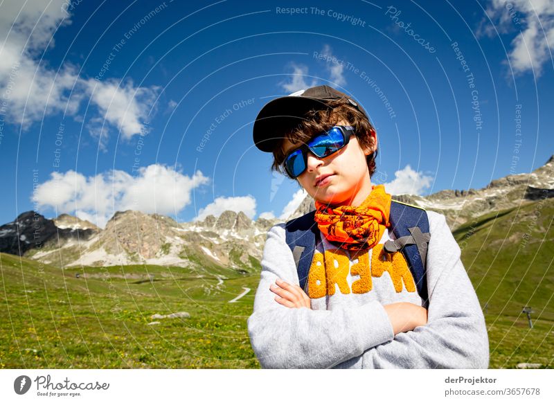 Young hiker at Piz Nair St. Moritz Swiss Alps Switzerland Grisons Engadine wanderlust Hiking trip Class outing nature conservation Endurance Determination