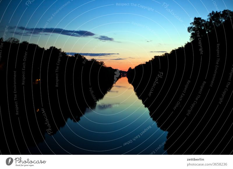 Hohenzollern canal in the evening Evening Channel Light Visual spectacle Night at night Nature shipping bank Transport Water sunset Sunset Spectrum