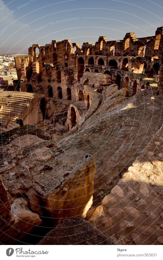 from inside of arena el jem in tunisia,coliseum Sand Sky Clouds Rock Ruin Stone Historic Brown Yellow Gray Red Black White Arena gold Tunisia brick ancien