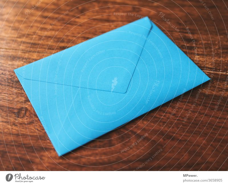 Blue letter Letter (Mail) Envelope (Mail) Wooden table mailshot Love letter Communicate Table Paper Information Sender dispatch send unopened Cancelation