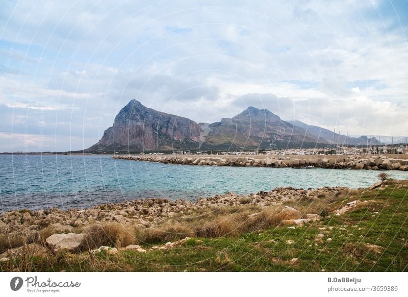 View to San Vito lo Capo in Sicily in the background the Monte Monaco with a height of 532m. Italy vacation Exterior shot Deserted Europe Colour photo Landscape