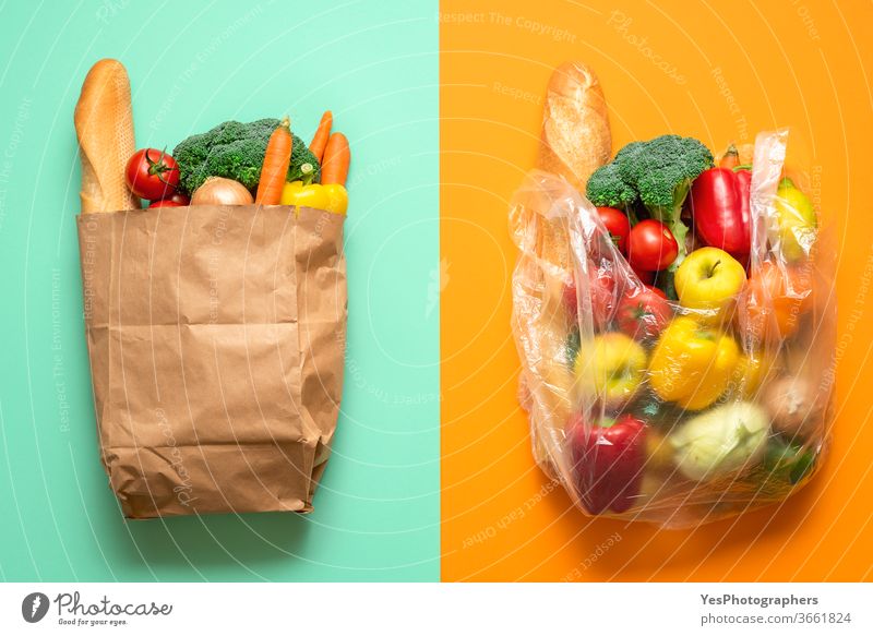 Grocery bags, paper versus plastic. Plastic-free shopping concept above view background ban bicolored biodegradable bread business buy choose colorful