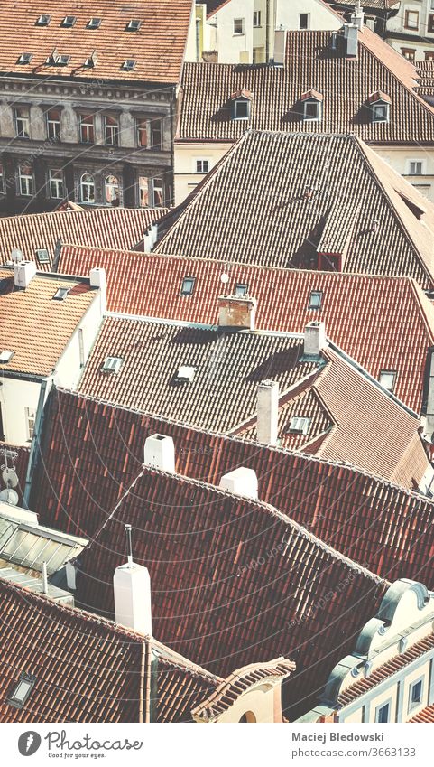 Roofs of Prague, retro toned picture, Czech Republic. city roof architecture old building house aerial from above tile urban Europe filtered vintage faded