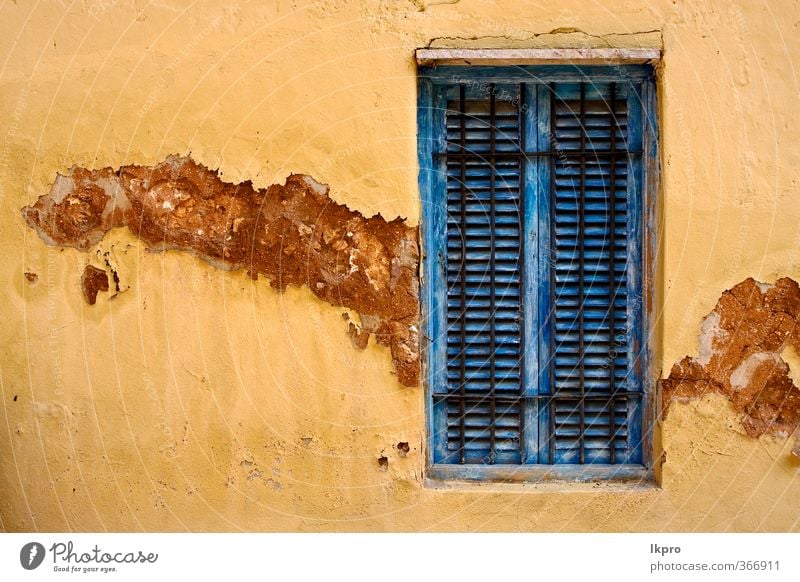 zanzibar prison island and a old Door Line Old Historic Blue Brown Yellow Black White Zanzibar window closed wall Grating wood brick broken Light blue