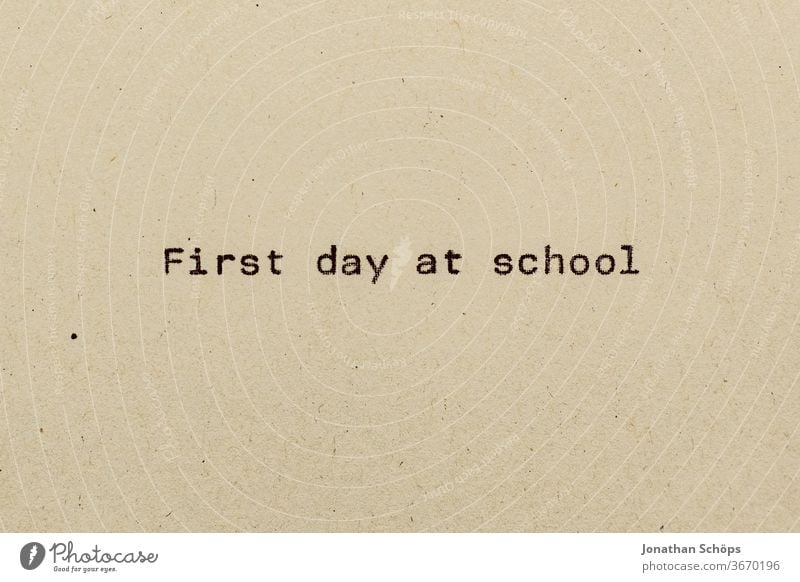 First day at school as text on paper with typewriter first school day Elementary school Paper Recycling Typewriter writing start of school typography Analog