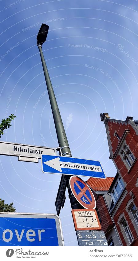 is over Street street sign No standing One-way street pediment Facade Brick Goettingen Wall (building) Signs and labeling Bans Road sign Signage Lanes & trails