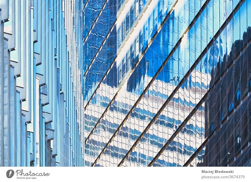 Modern buildings facades abstract architecture background. window skyscraper wall New York city office apartment real estate tower high day modern USA NYC urban